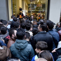 People waiting outside department store