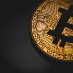 bitcoin logo in the dark