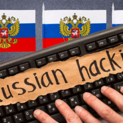 Russian hacking, inscription on torn paper sheet. Russia hacking concept