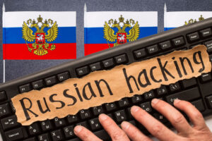Russian hacking, inscription on torn paper sheet. Russia hacking concept