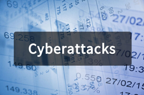 Cyberattacks written on translucent black space