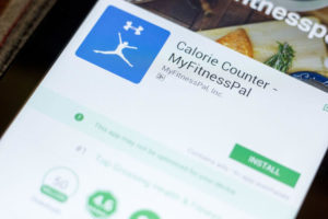 MyFitnessPal mobile app on the display of tablet PC.