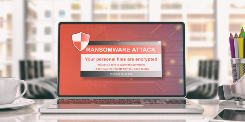 Ransomware virus alert on a computer laptop screen, blur office background. 3d illustration